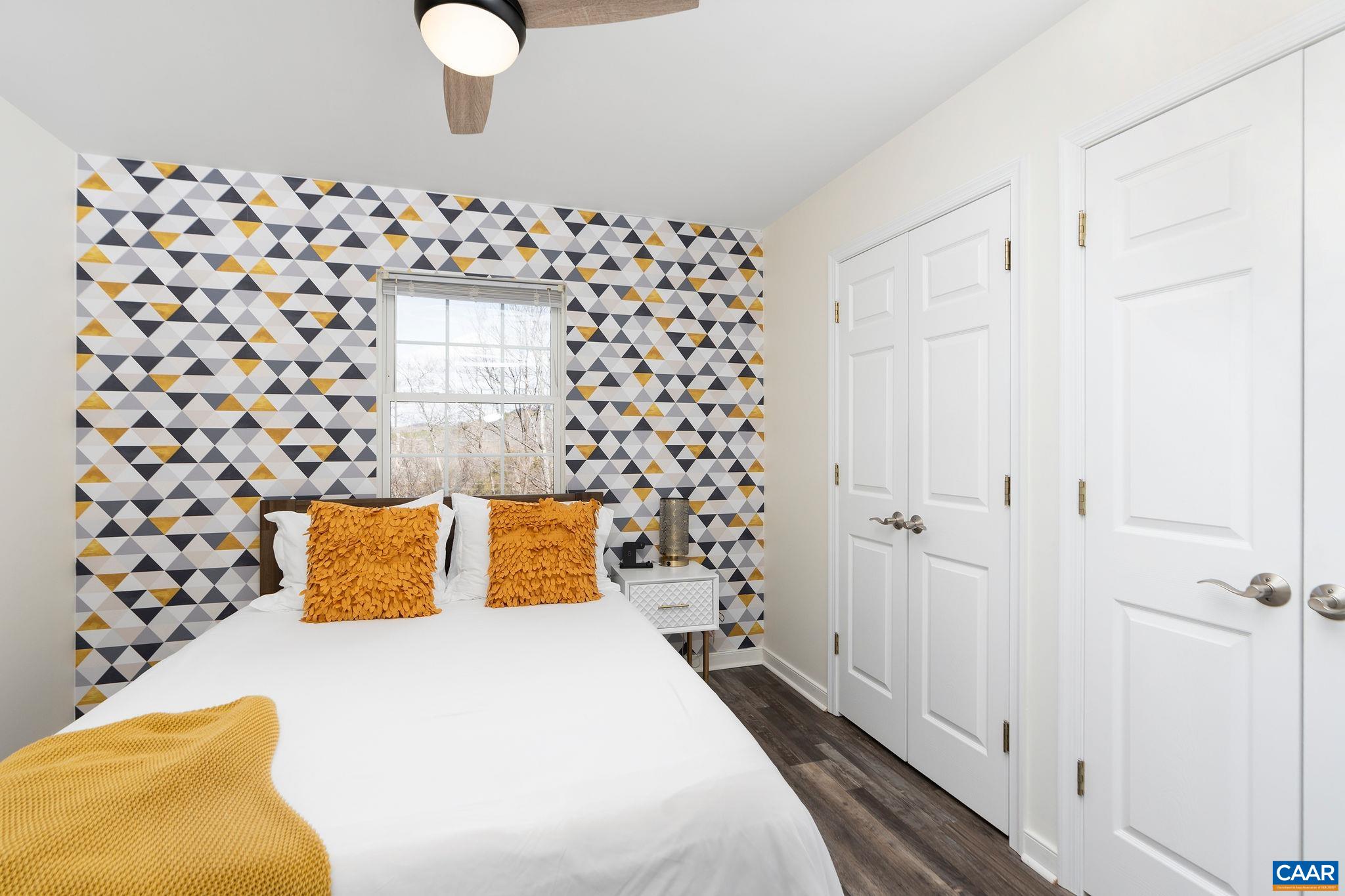 57 Pounding Branch Road Afton, VA 22920 - Photo 13 of 31 a bedroom with a bed and a lamp