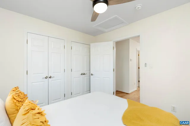 a bathroom with a sink a toilet and shower curtain