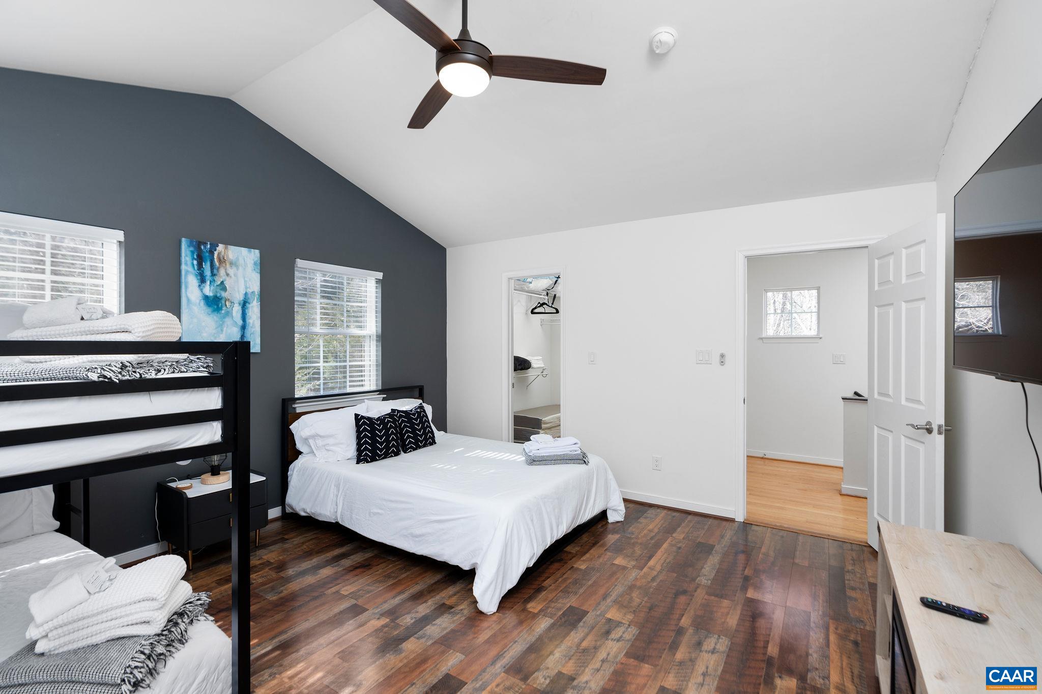 57 Pounding Branch Road Afton, VA 22920 - Photo 22 of 31 a bedroom with a bed and wooden floor