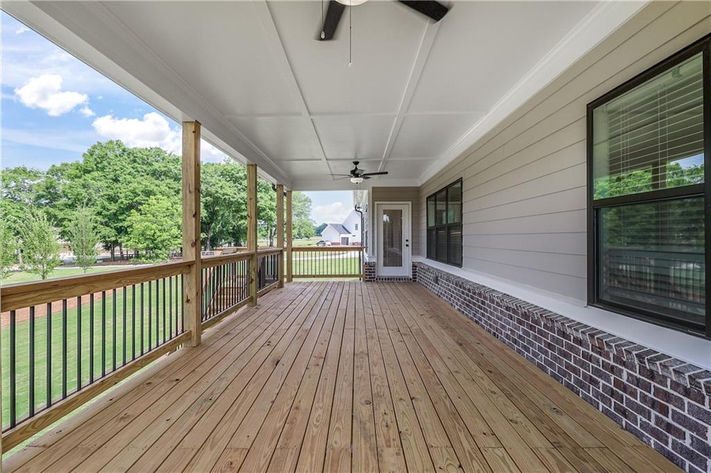 2113 Stonegate Way Monroe, GA 30656 - Photo 40 of 43 a view of a house with wooden floor