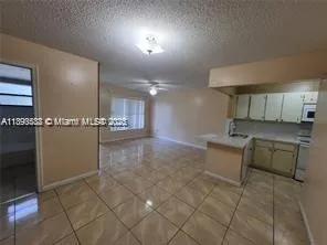 a view of a livingroom with furniture and a livingroom