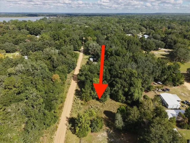 a view of a lake from a yard