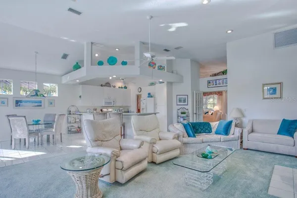 a living room with furniture and a table