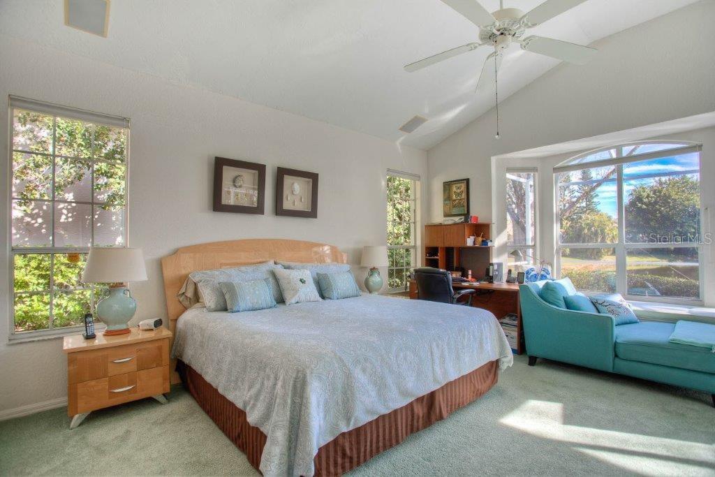 7101 Victoria Circle University Park, FL 34201 - Photo 22 of 31 a bedroom with a bed and a couch