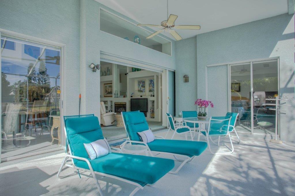 7101 Victoria Circle University Park, FL 34201 - Photo 24 of 31 a view of a dining room with furniture and a chandelier