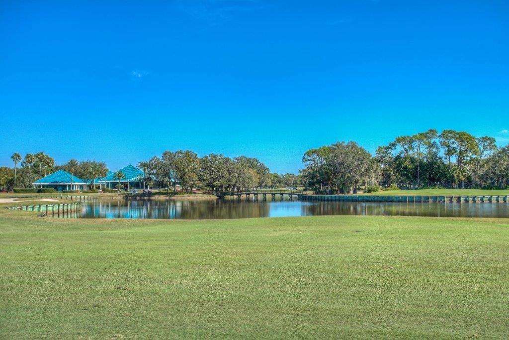 7101 Victoria Circle University Park, FL 34201 - Photo 28 of 31 a view of a lake with houses in the back