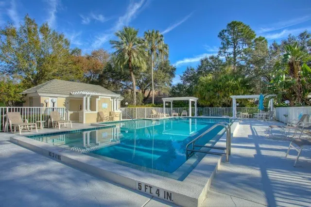 a front view of a house with swimming pool