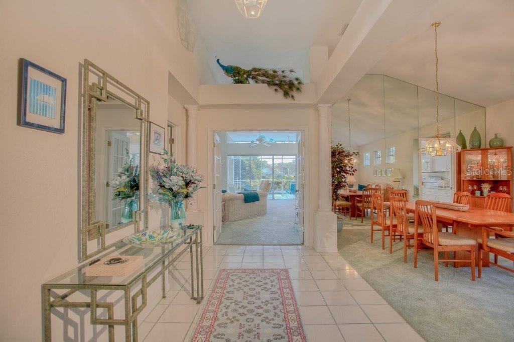 7101 Victoria Circle University Park, FL 34201 - Photo 5 of 31 a view of a dining room with furniture window and wooden floor