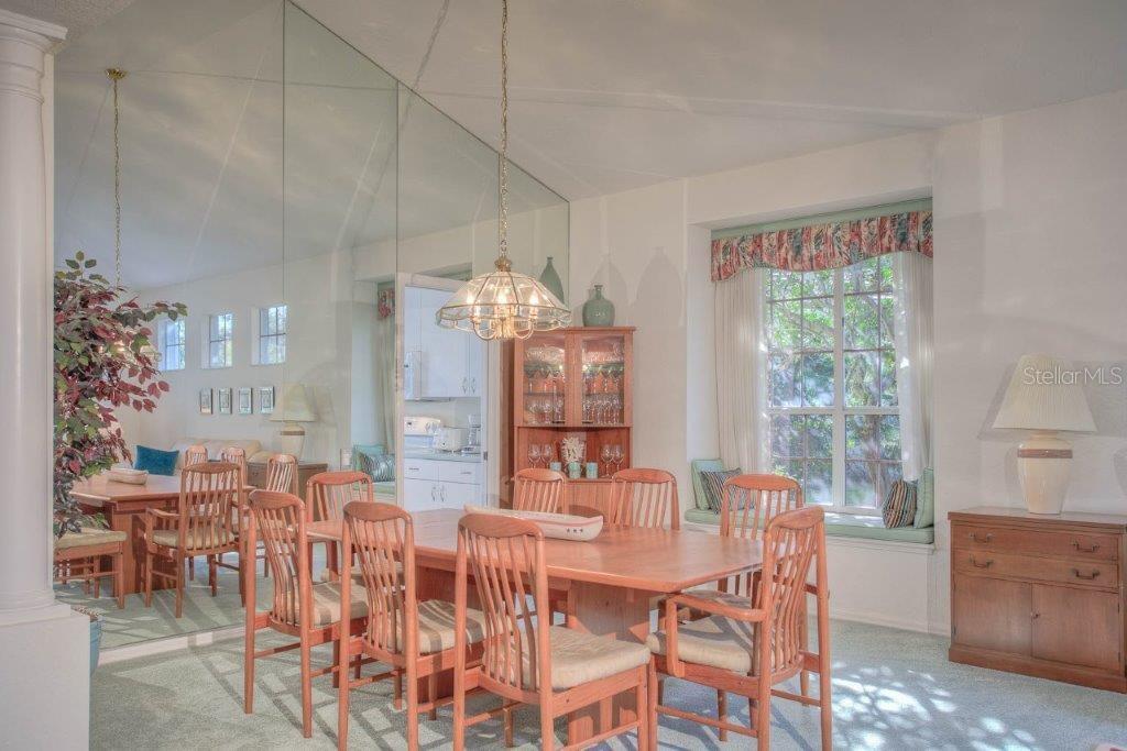 7101 Victoria Circle University Park, FL 34201 - Photo 6 of 31 a view of a dining room with furniture window and outside view