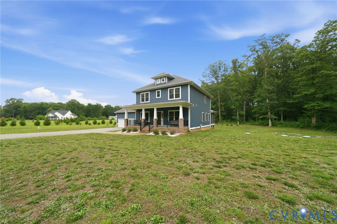 7598 Rural Point Road Mechanicsville, VA 23116 - Photo 37 of 41 a front view of a house with a yard