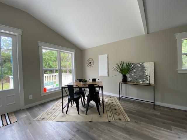59 Chelsey Lane Santa Rosa Beach, FL 32459 - Photo 12 of 31 a view of a dining room with furniture window and wooden floor