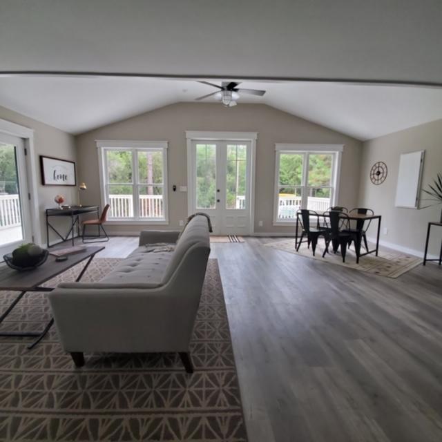 59 Chelsey Lane Santa Rosa Beach, FL 32459 - Photo 14 of 31 a living room with furniture two window and wooden floor