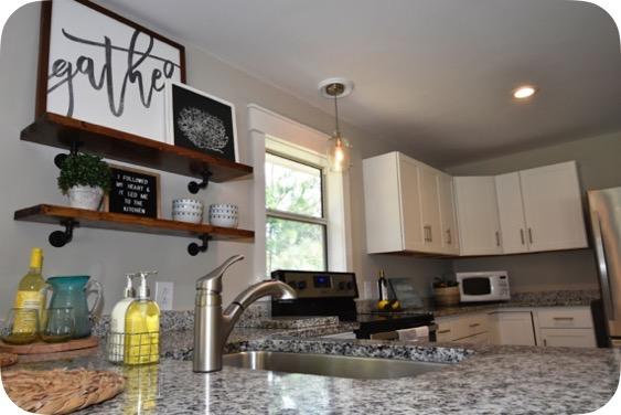 59 Chelsey Lane Santa Rosa Beach, FL 32459 - Photo 18 of 31 a kitchen with lots of counter top space cabinets and a window