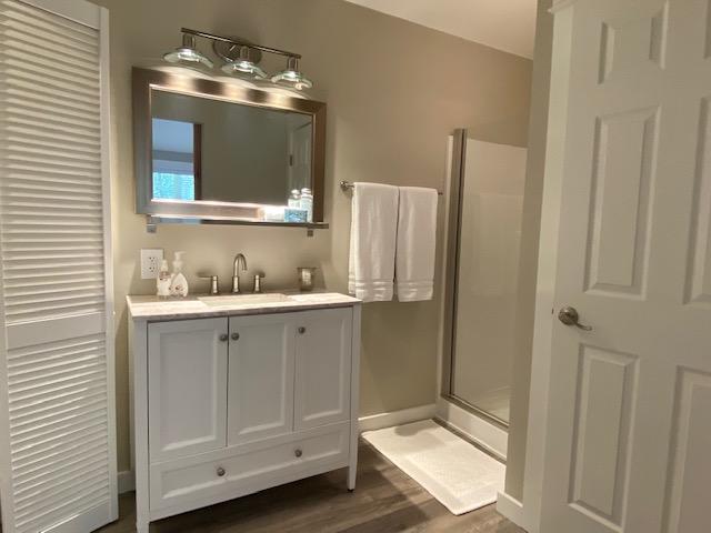 59 Chelsey Lane Santa Rosa Beach, FL 32459 - Photo 20 of 31 a bathroom with a double vanity sink and mirror