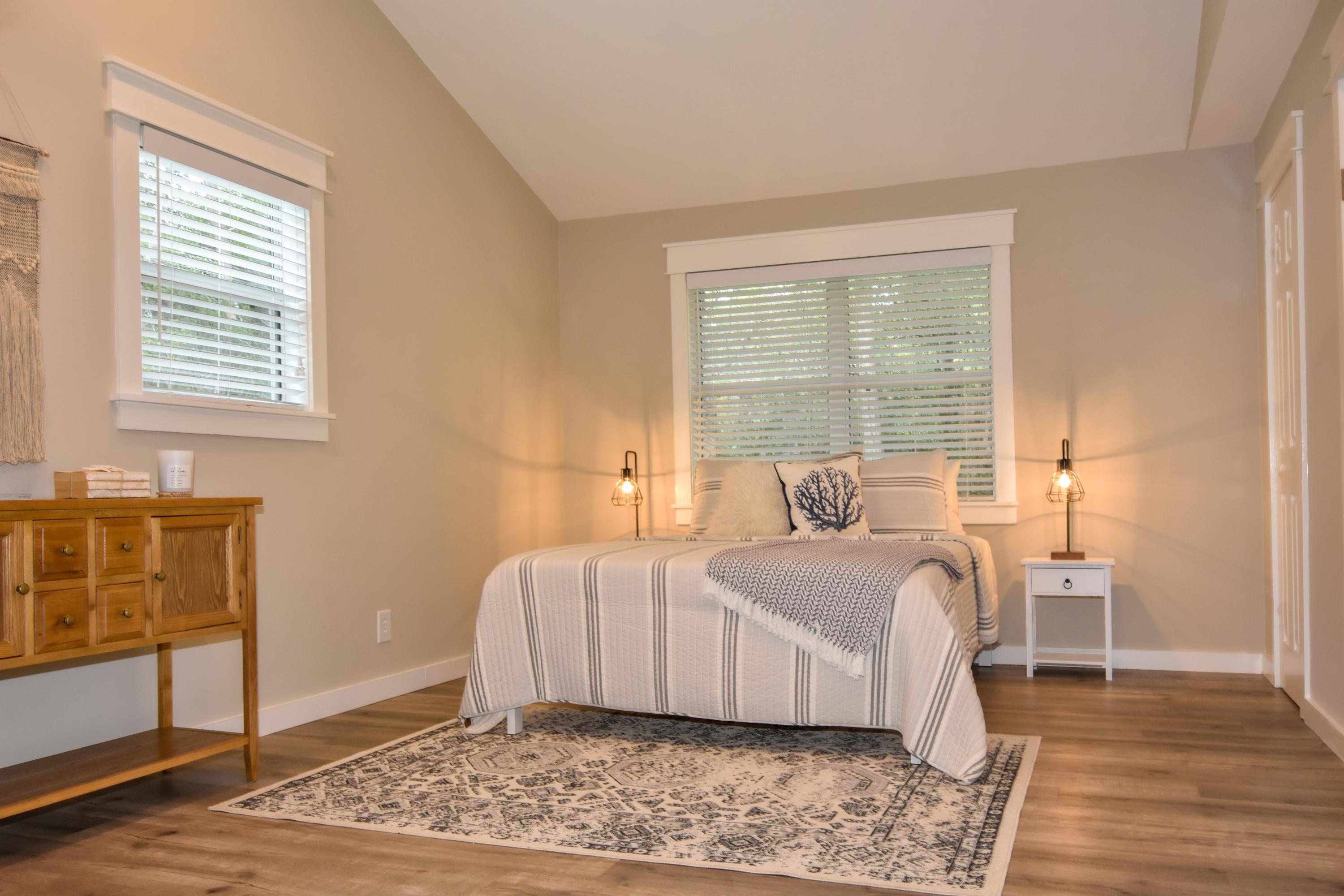 59 Chelsey Lane Santa Rosa Beach, FL 32459 - Photo 21 of 31 a bedroom with a bed and wooden floor