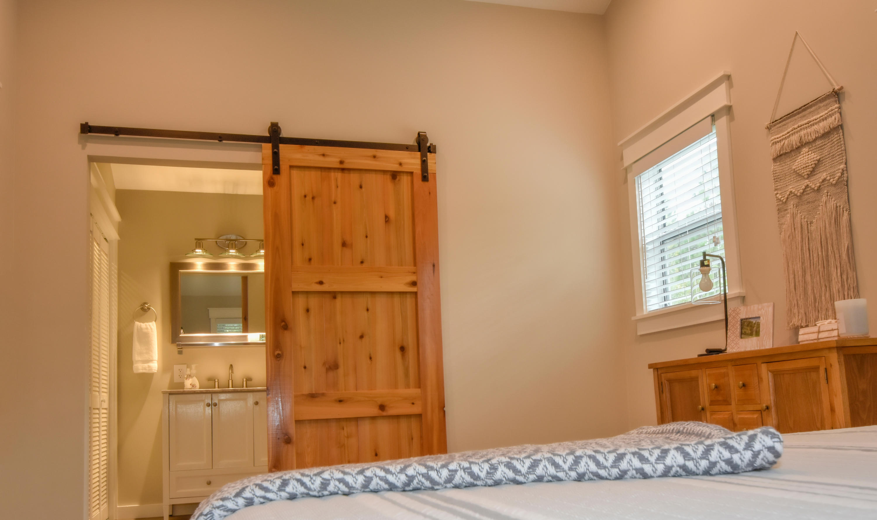 59 Chelsey Lane Santa Rosa Beach, FL 32459 - Photo 22 of 31 a bedroom with a bed and wooden floor