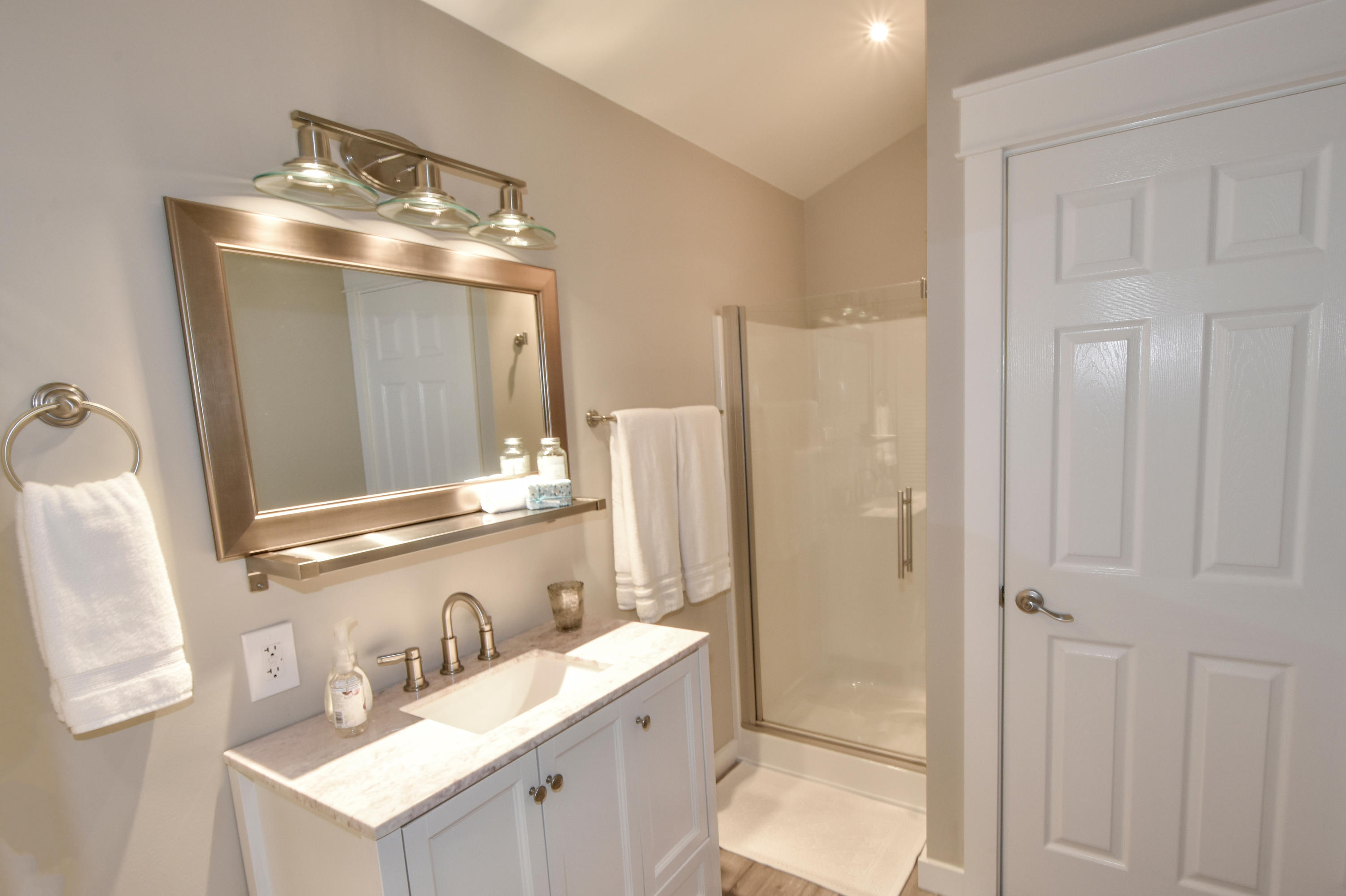 59 Chelsey Lane Santa Rosa Beach, FL 32459 - Photo 23 of 31 a bathroom with a double vanity sink mirror and shower