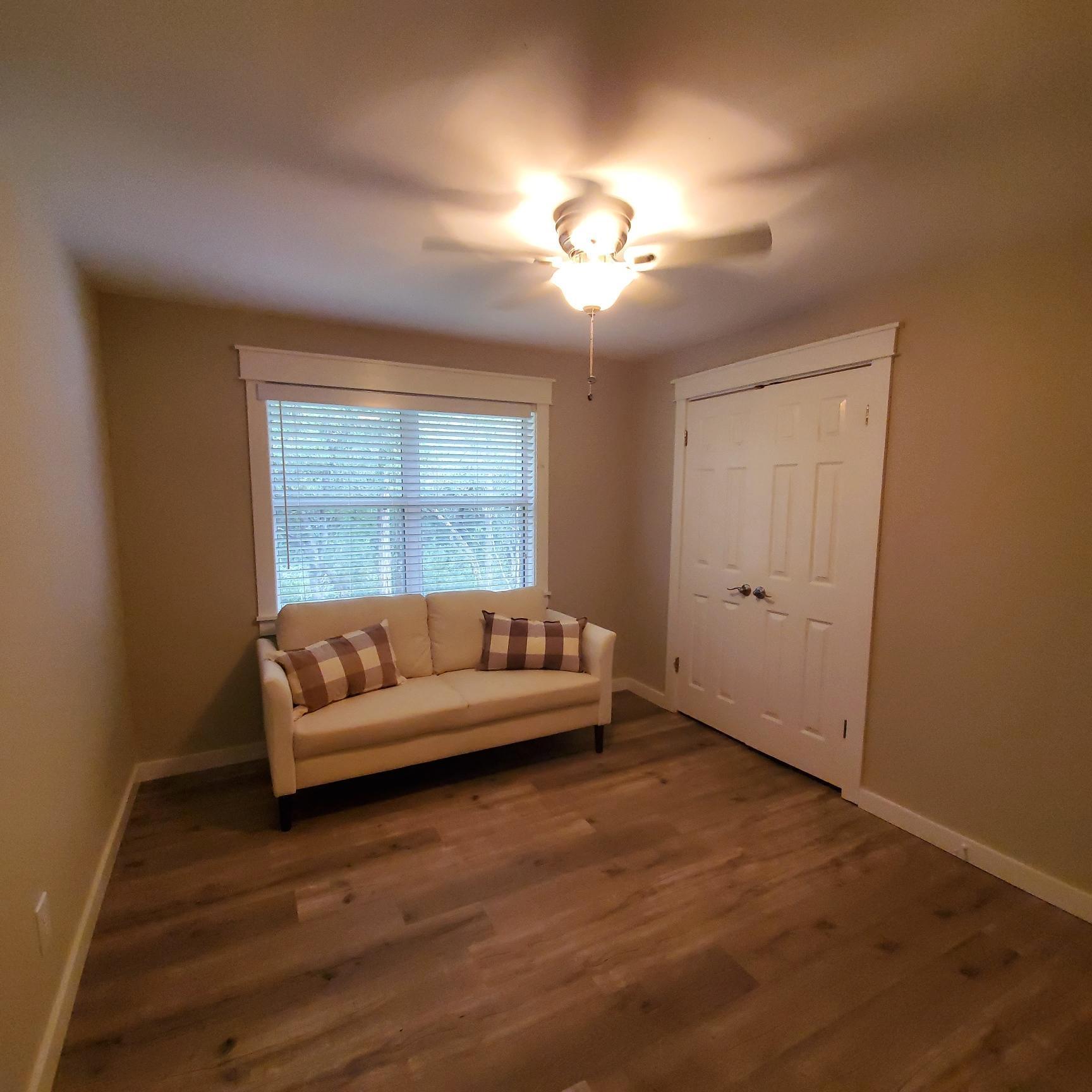 59 Chelsey Lane Santa Rosa Beach, FL 32459 - Photo 26 of 31 a living room with furniture and a large window