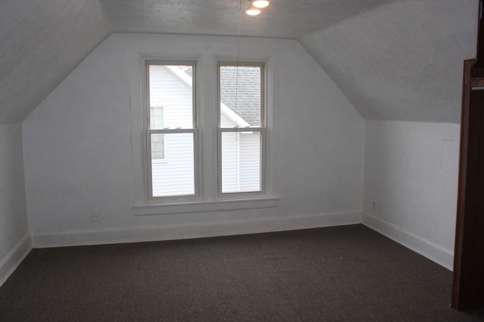 511 3rd Avenue Rock Falls, IL 61071 - Photo 6 of 9 an empty room with a window