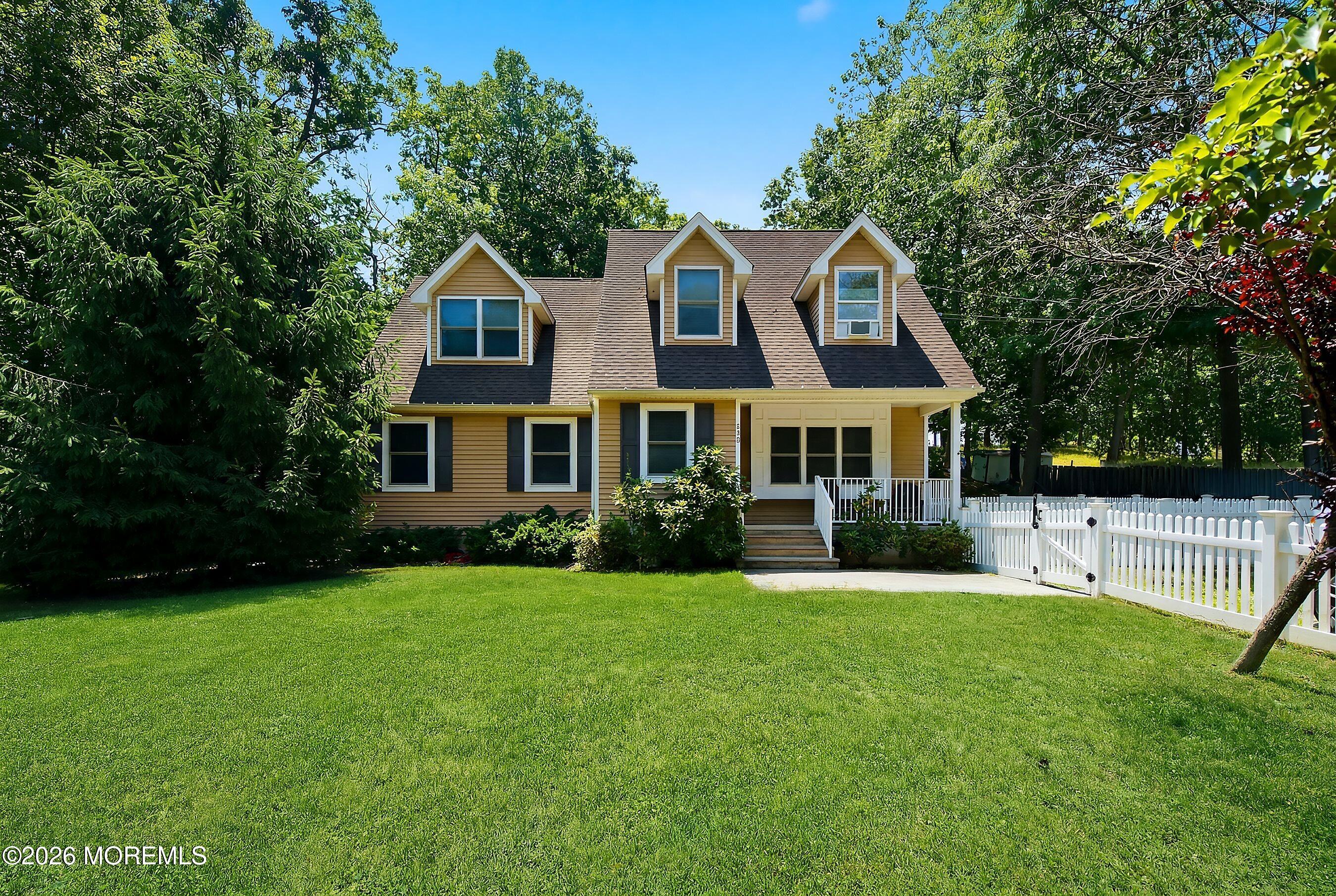 935 Bethel Church Road Jackson, NJ 08527 - Photo 1 of 32 a front view of a house with a yard
