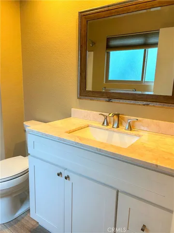 a bathroom with a sink and a toilet