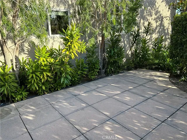 a view of a garden with trees