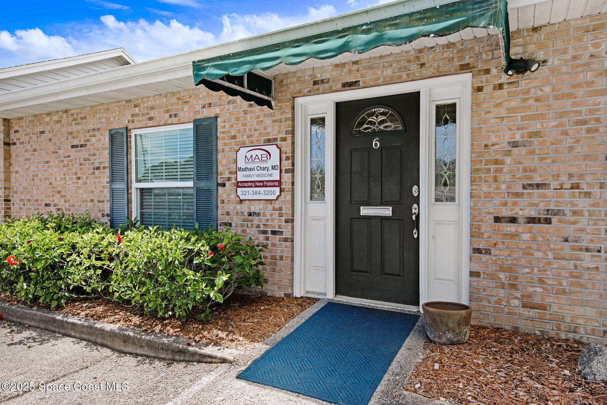 1801 Sarno Road, Unit 5 & 6 Melbourne, FL 32935 - Photo 1 of 44 a front view of a house with shower