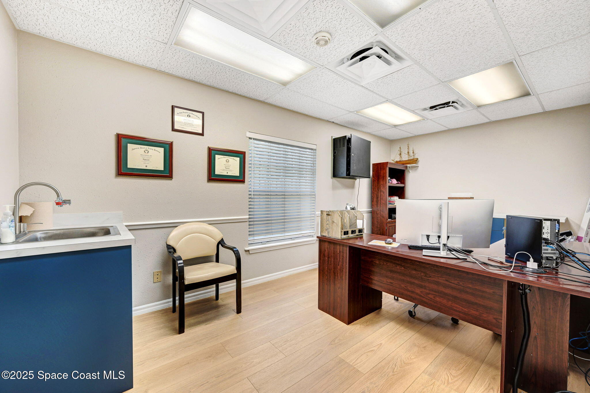 1801 Sarno Road, Unit 5 & 6 Melbourne, FL 32935 - Photo 11 of 44 a view of a workspace with furniture