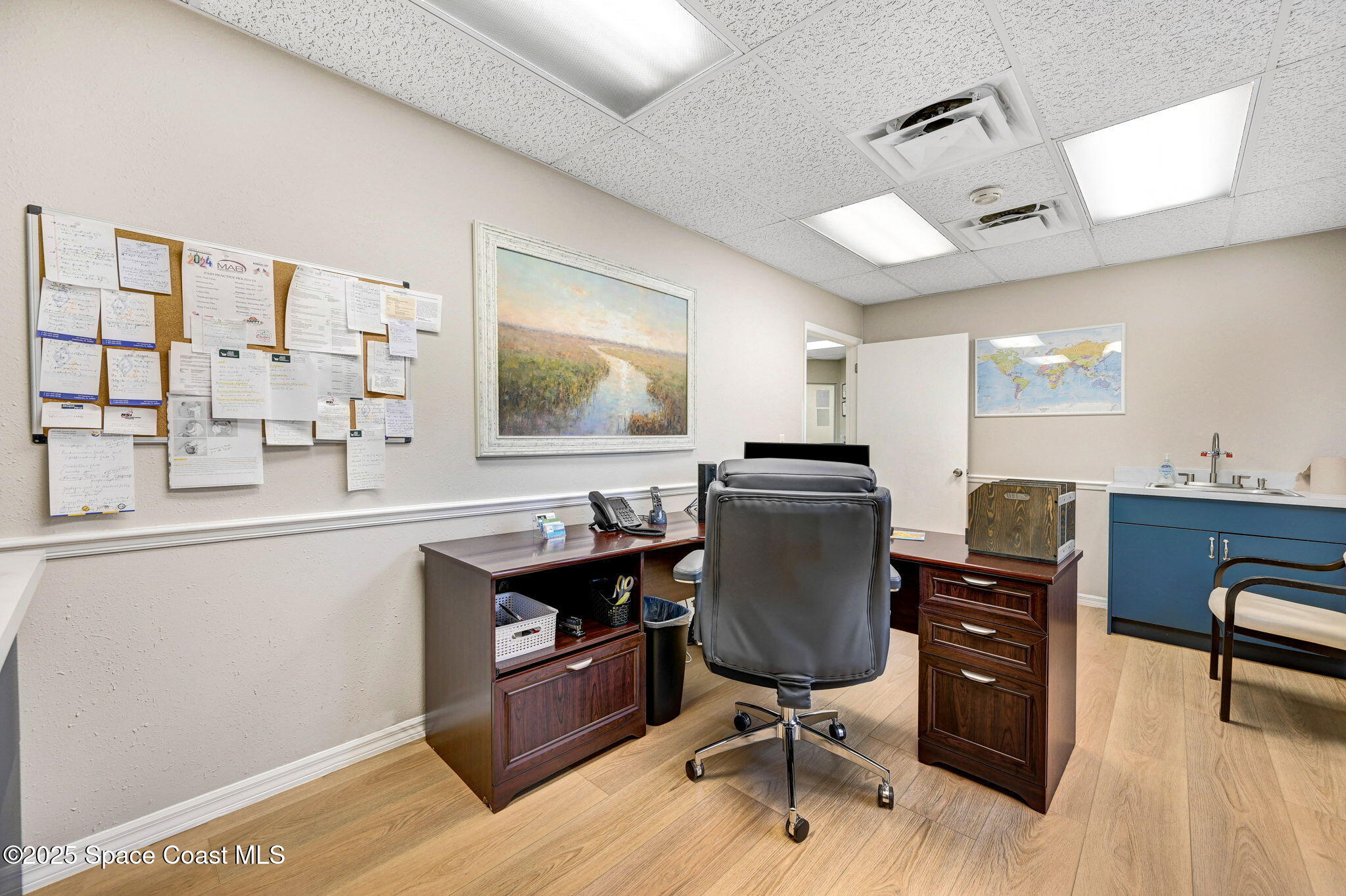 1801 Sarno Road, Unit 5 & 6 Melbourne, FL 32935 - Photo 13 of 44 a view of a workspace with furniture and a window