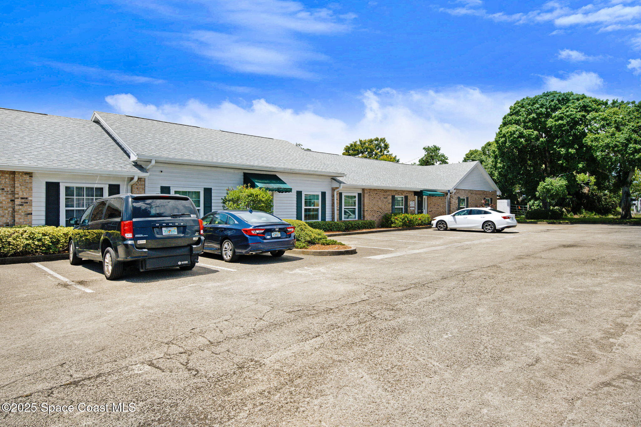 1801 Sarno Road, Unit 5 & 6 Melbourne, FL 32935 - Photo 2 of 44 a car parked in front of house