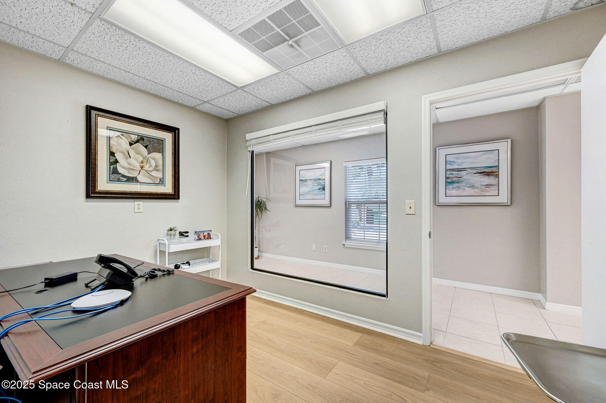 1801 Sarno Road, Unit 5 & 6 Melbourne, FL 32935 - Photo 22 of 44 a room with furniture and view of kitchen
