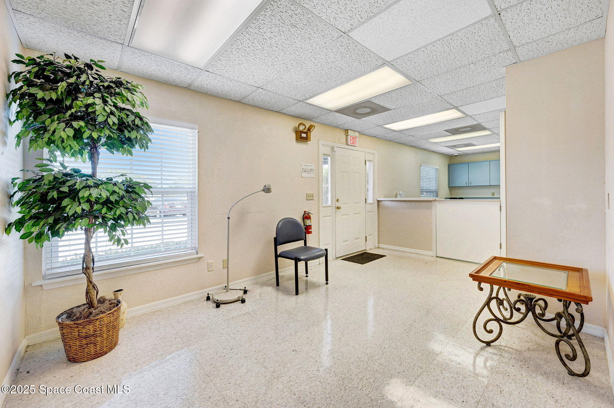 1801 Sarno Road, Unit 5 & 6 Melbourne, FL 32935 - Photo 36 of 44 a view of a room with gym equipment and window
