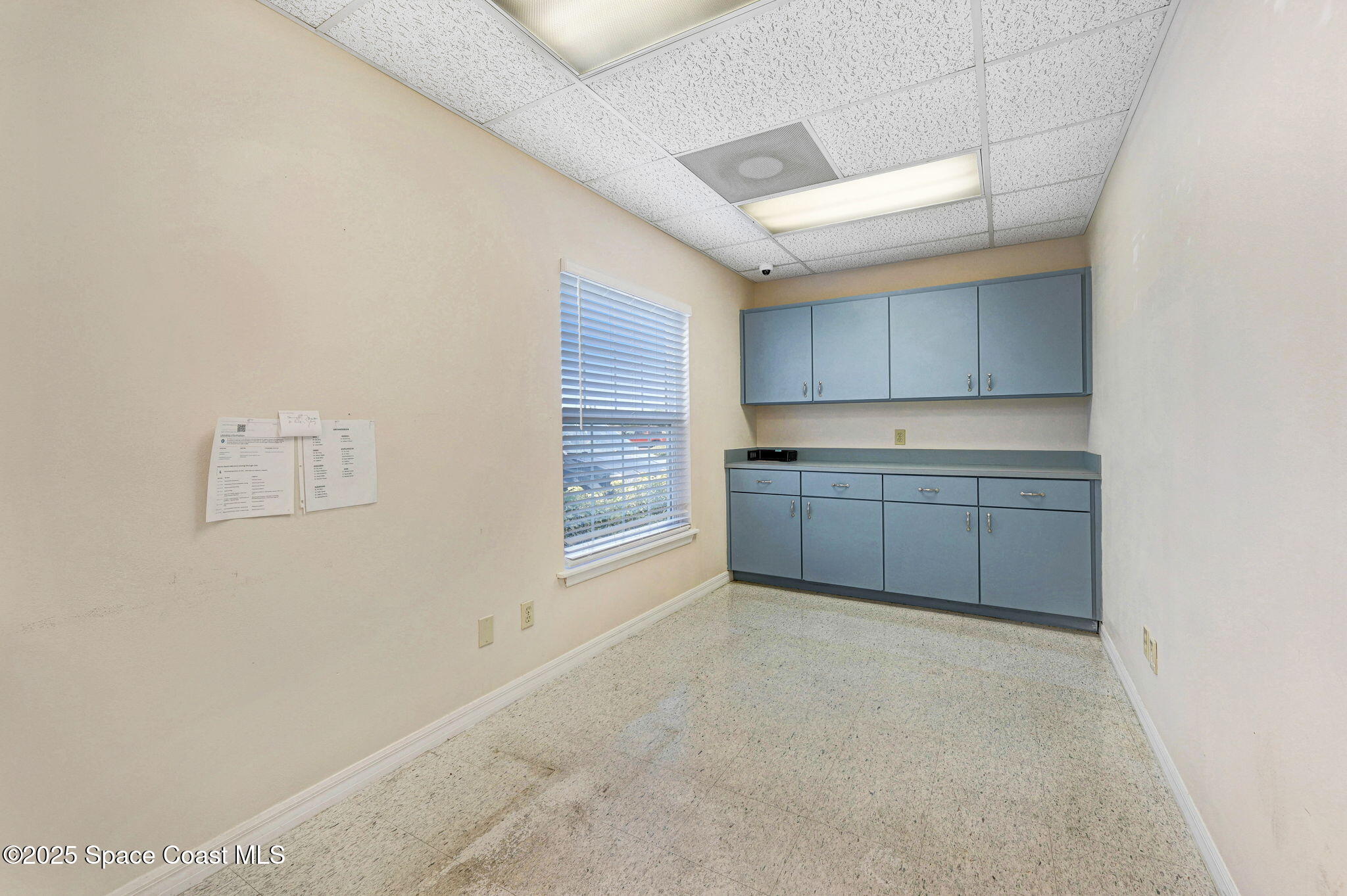 1801 Sarno Road, Unit 5 & 6 Melbourne, FL 32935 - Photo 41 of 44 a view of a kitchen with a sink cabinets and a window