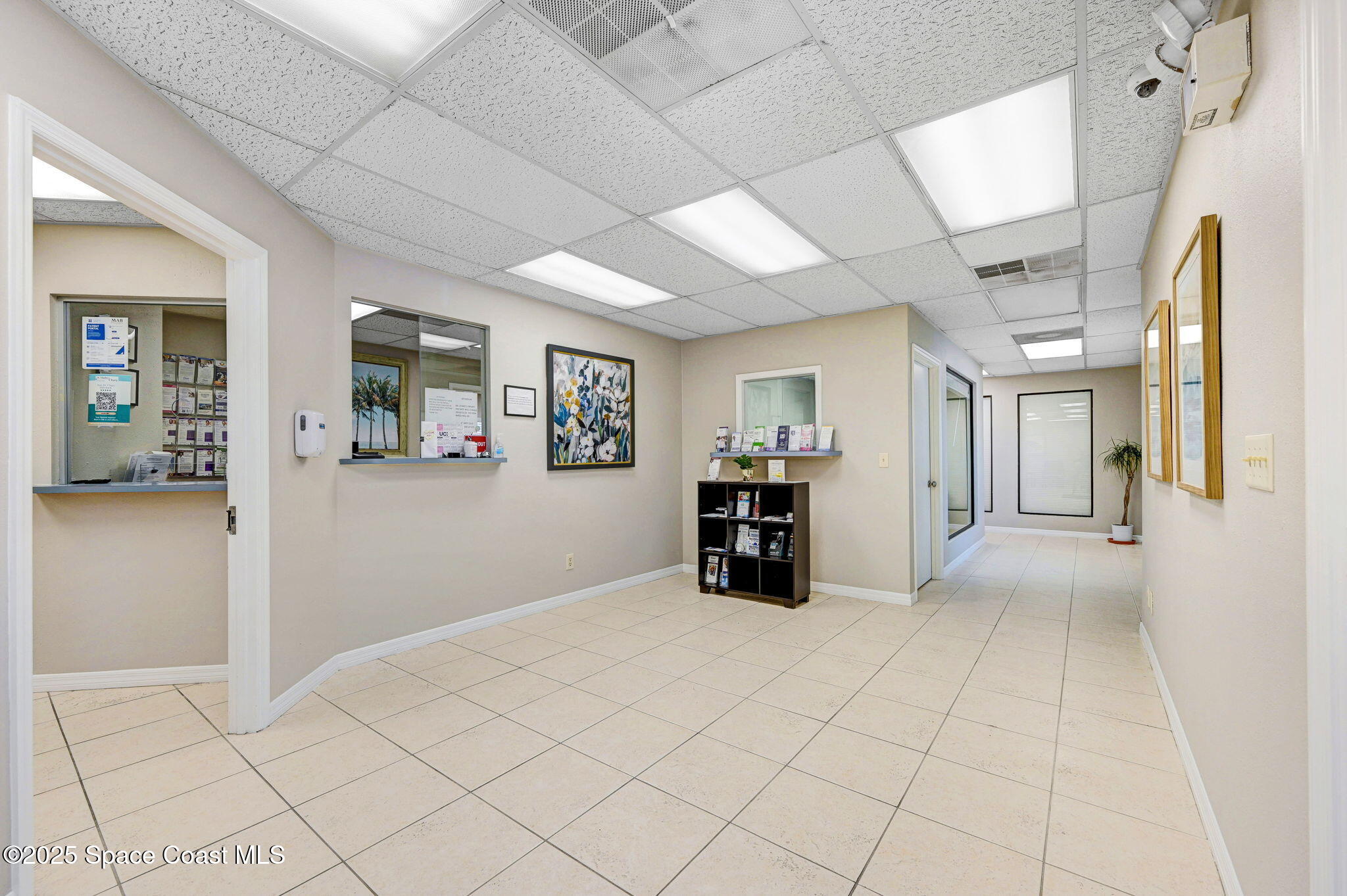 1801 Sarno Road, Unit 5 & 6 Melbourne, FL 32935 - Photo 10 of 44 a view of an empty room with a window