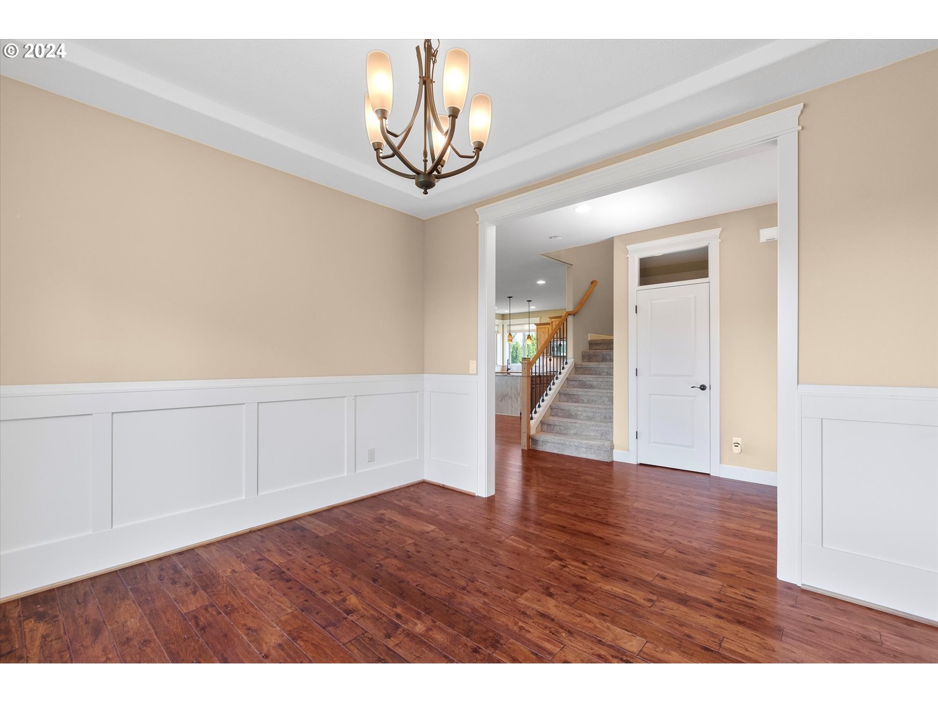 1760 South 18th Circle Ridgefield, WA 98642 - Photo 17 of 36 a view of an empty room with wooden floor