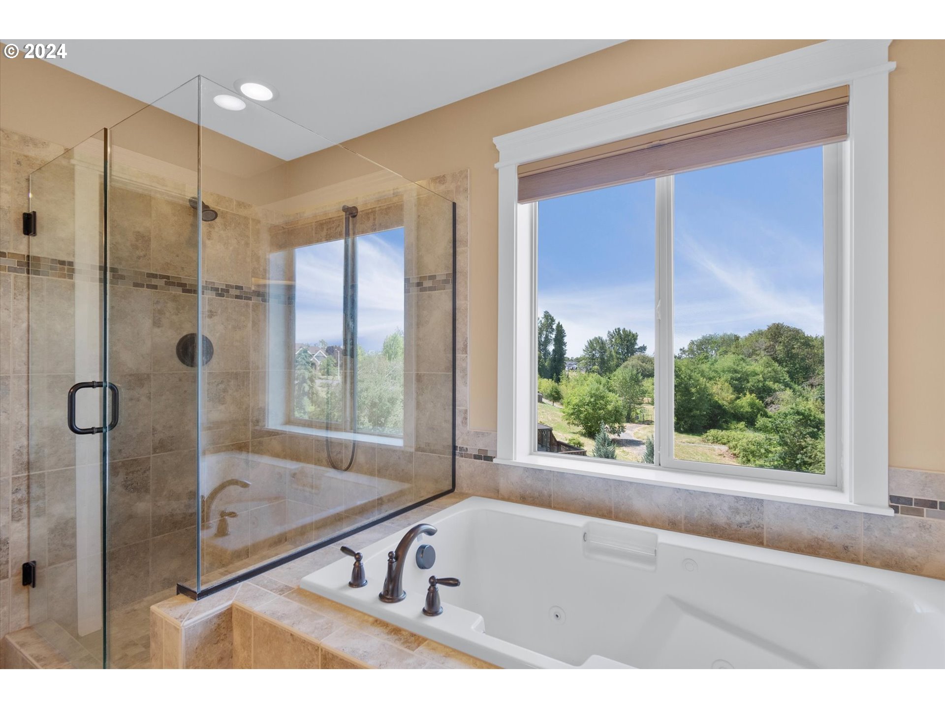 1760 South 18th Circle Ridgefield, WA 98642 - Photo 31 of 36 a bathroom with a tub shower and sink
