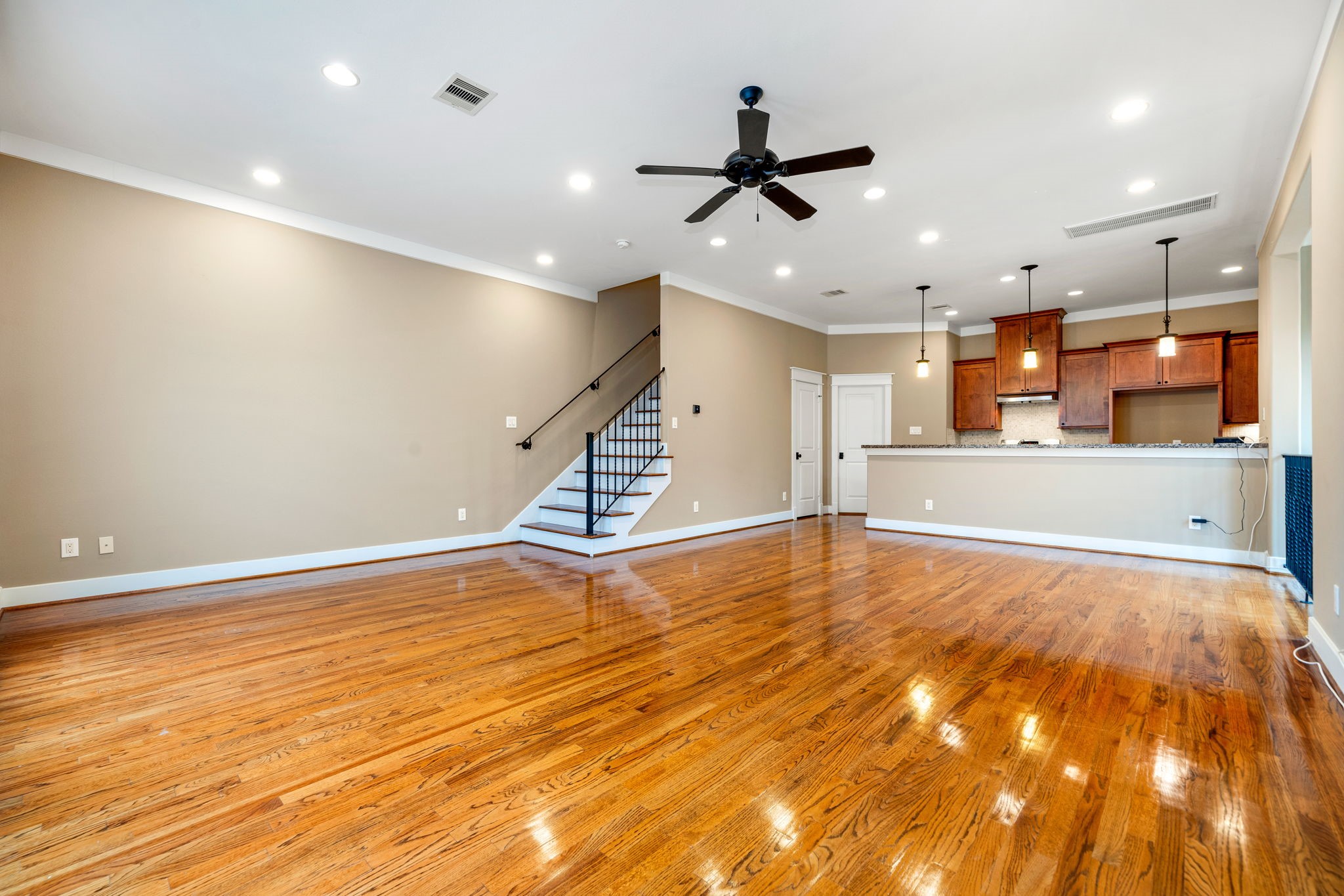 229 Knox Street Houston, TX 77007 - Photo 7 of 33 a view of a livingroom with a kitchen