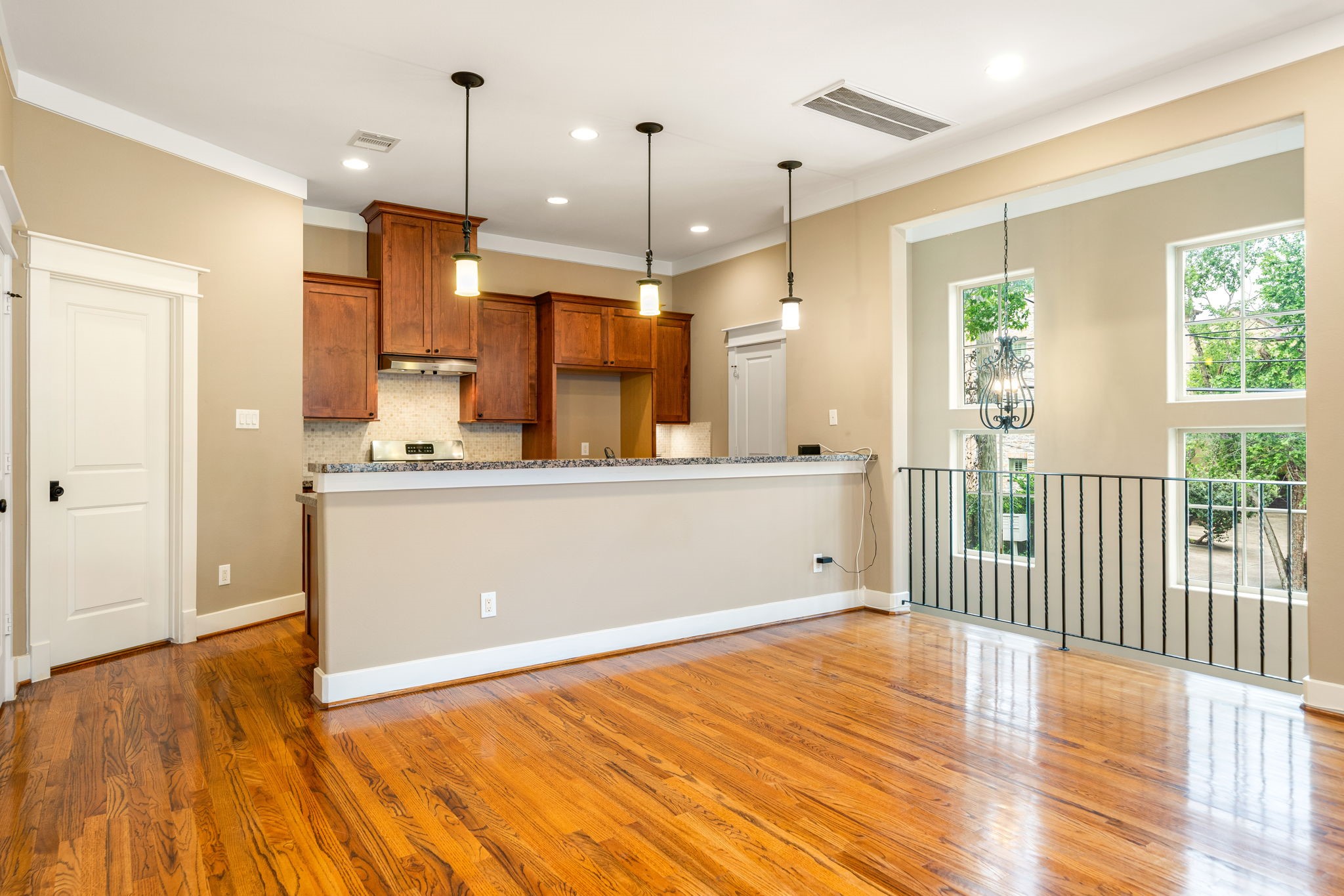 229 Knox Street Houston, TX 77007 - Photo 10 of 33 a view of a kitchen with wooden floor