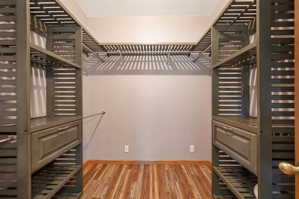 a room with furniture and a flat screen tv