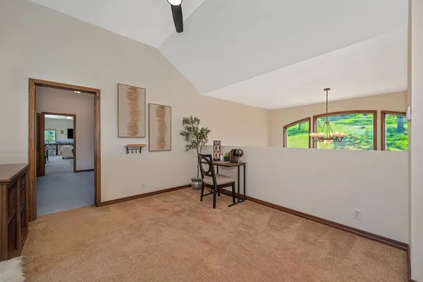 a view of a house with a backyard