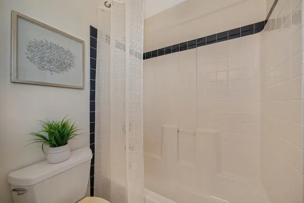 a view of a lush green space near a lake view