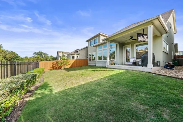 a view of a house with a swimming pool