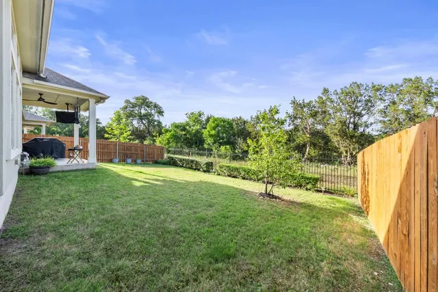 a view of a garden with an outdoor space