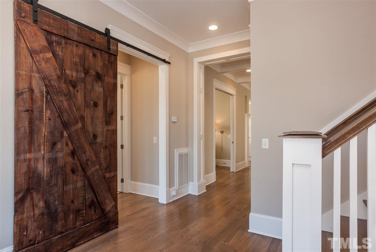 2619 Davis Street Raleigh, NC 27608 - Photo 2 of 25 a view of a bathroom from a hallway
