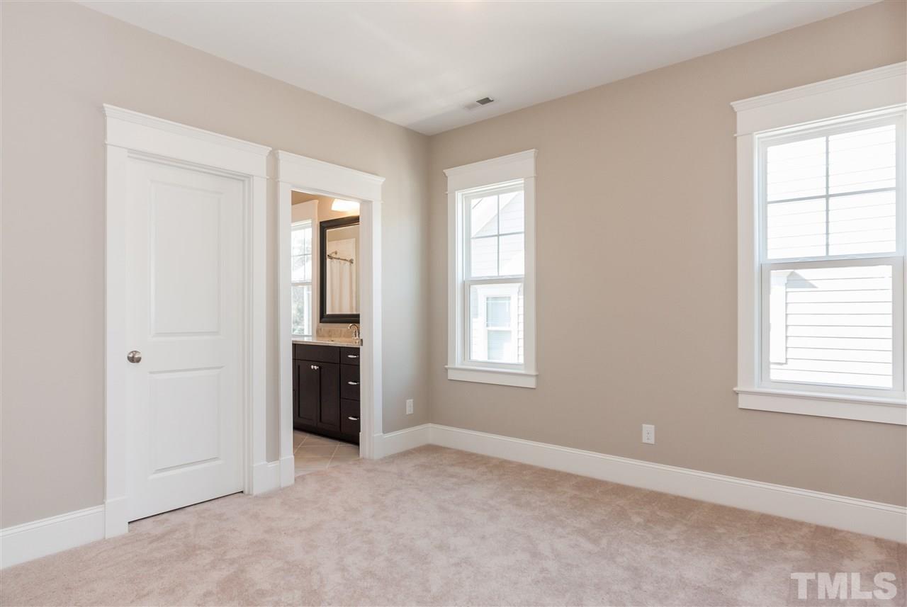 2619 Davis Street Raleigh, NC 27608 - Photo 20 of 25 an empty room with windows and closet