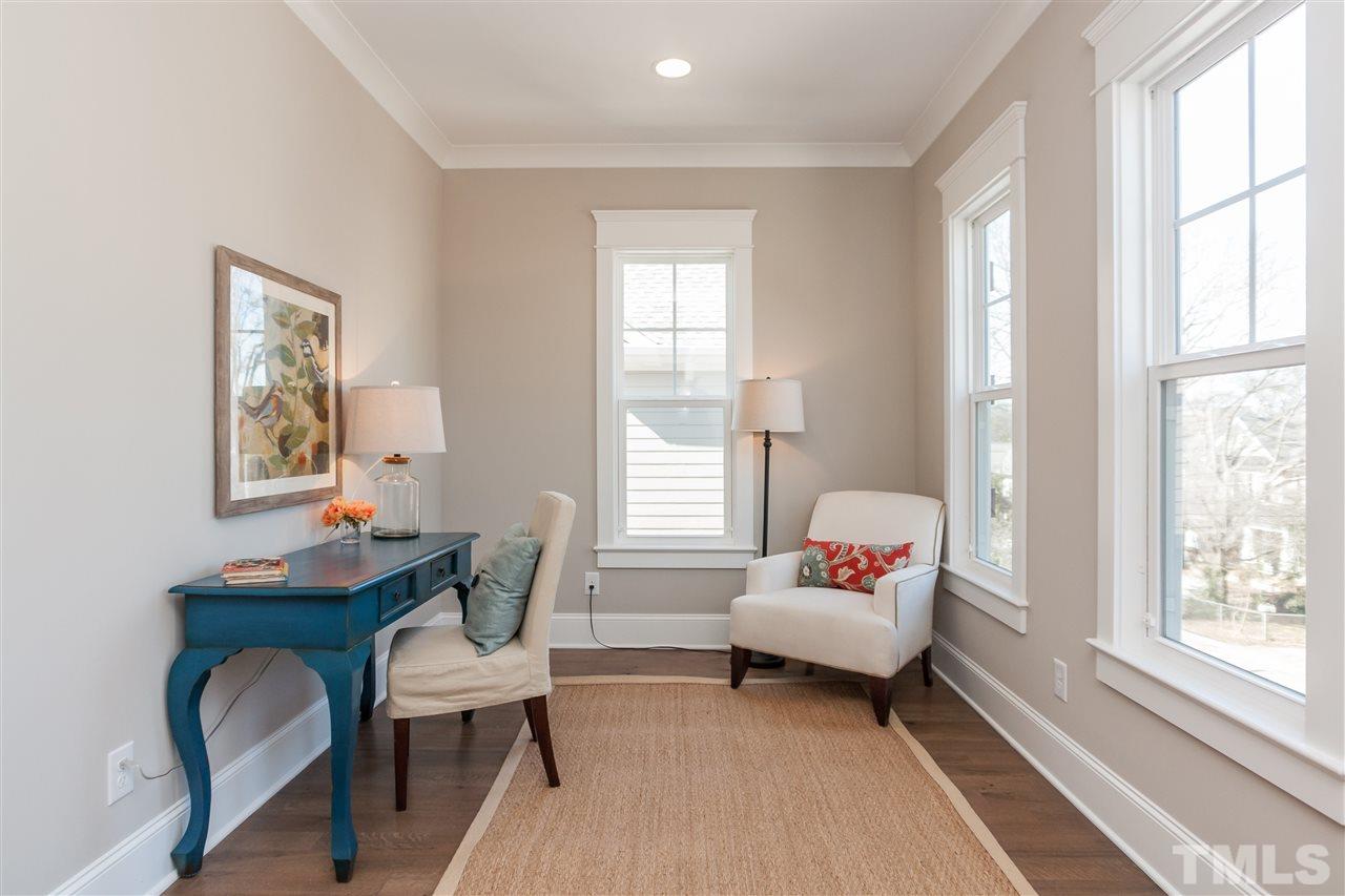 2619 Davis Street Raleigh, NC 27608 - Photo 22 of 25 a living room with furniture and a window