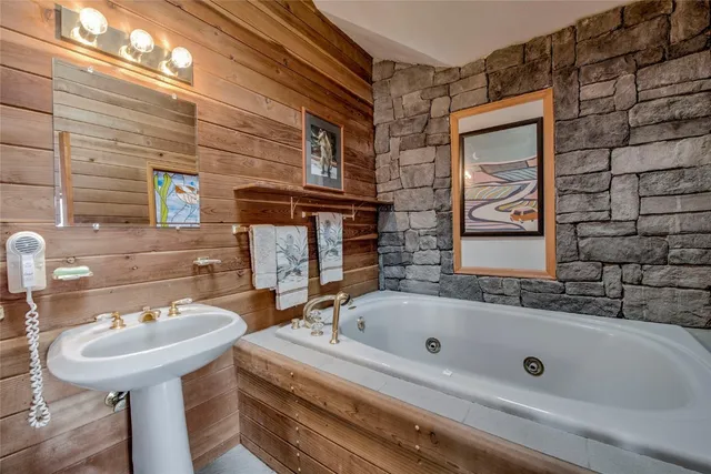 a bathroom with a sink and a bathtub