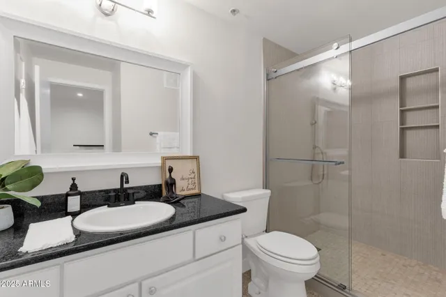 a view of a livingroom with wooden floor