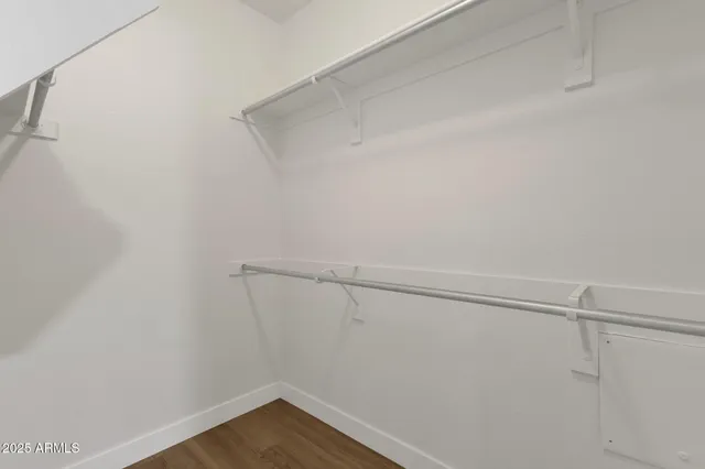 a bathroom with a shower and toilet