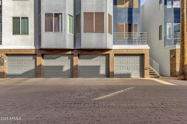 a view of a house with a street